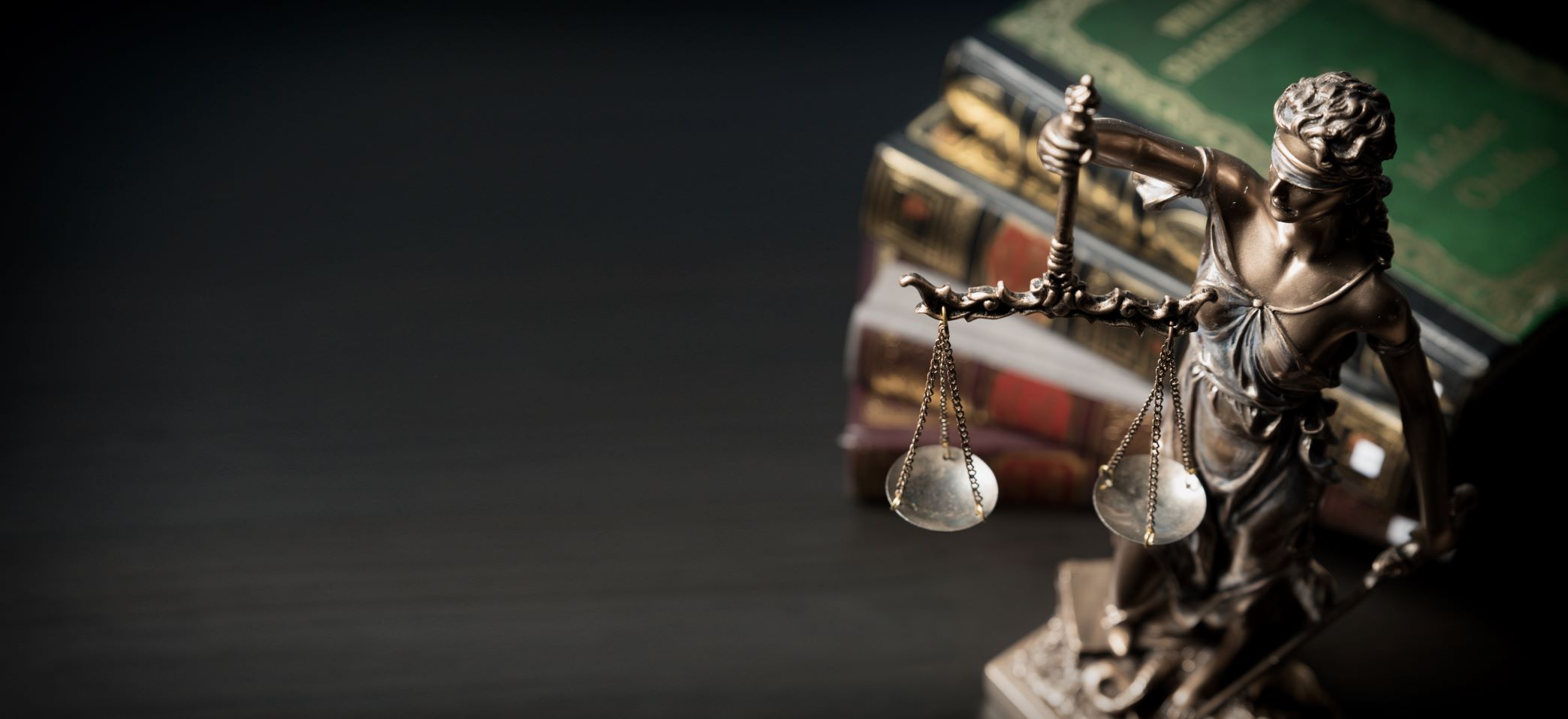 Picture of scales and some books.