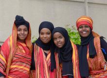 photo of four young women in a group shot